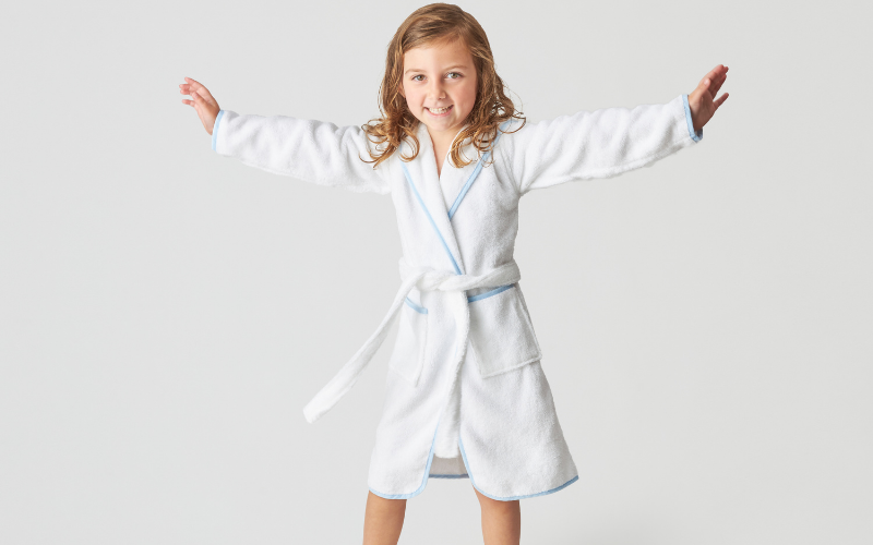 little girl in robe