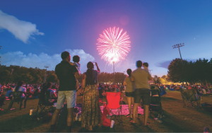 family watching fireworks