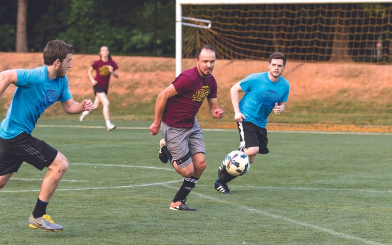 men playing soccer