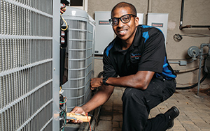 Technician working on HVAC