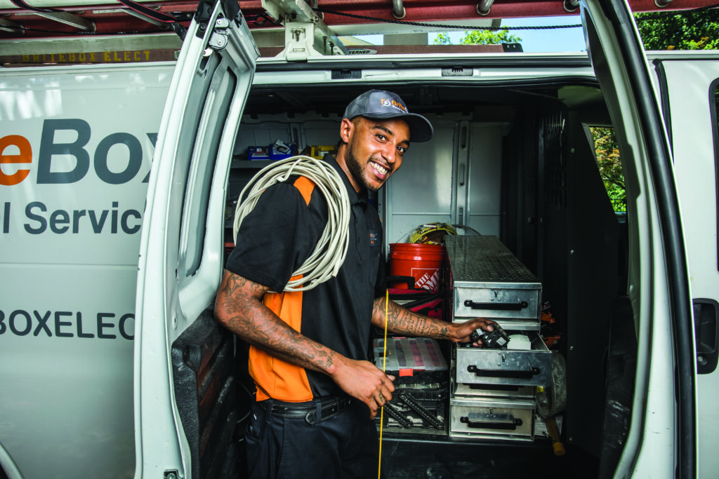 BriteBox, electrical van, man in orange vest