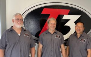 Three men at T3 Auto Repair