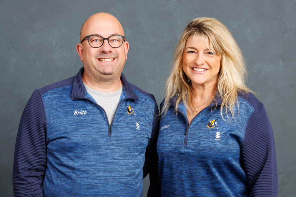 Man and woman in blue shirts